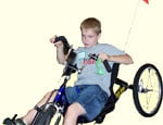 boy riding an accessible bike