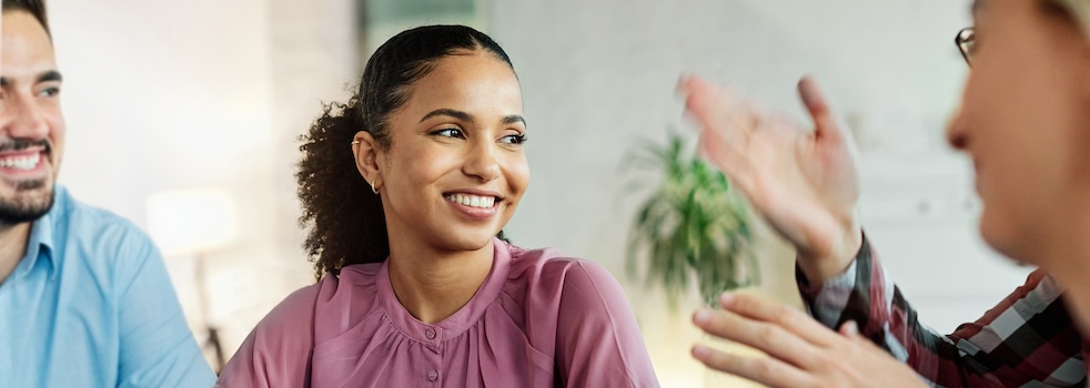 Portrait of a smart young businesswoman during meeting in the office or classroom. Startup and succesful business concept or education and student concept